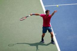 CINCINNATI, OH - AUGUST 23: Roger Federer of Switzerland serves to Novak Djokovic of Serbia during the finals of the Western & Southern Open at the Linder Family Tennis Center on August 23, 2015 in Cincinnati, Ohio. (Photo by Rob Carr/Getty Images)